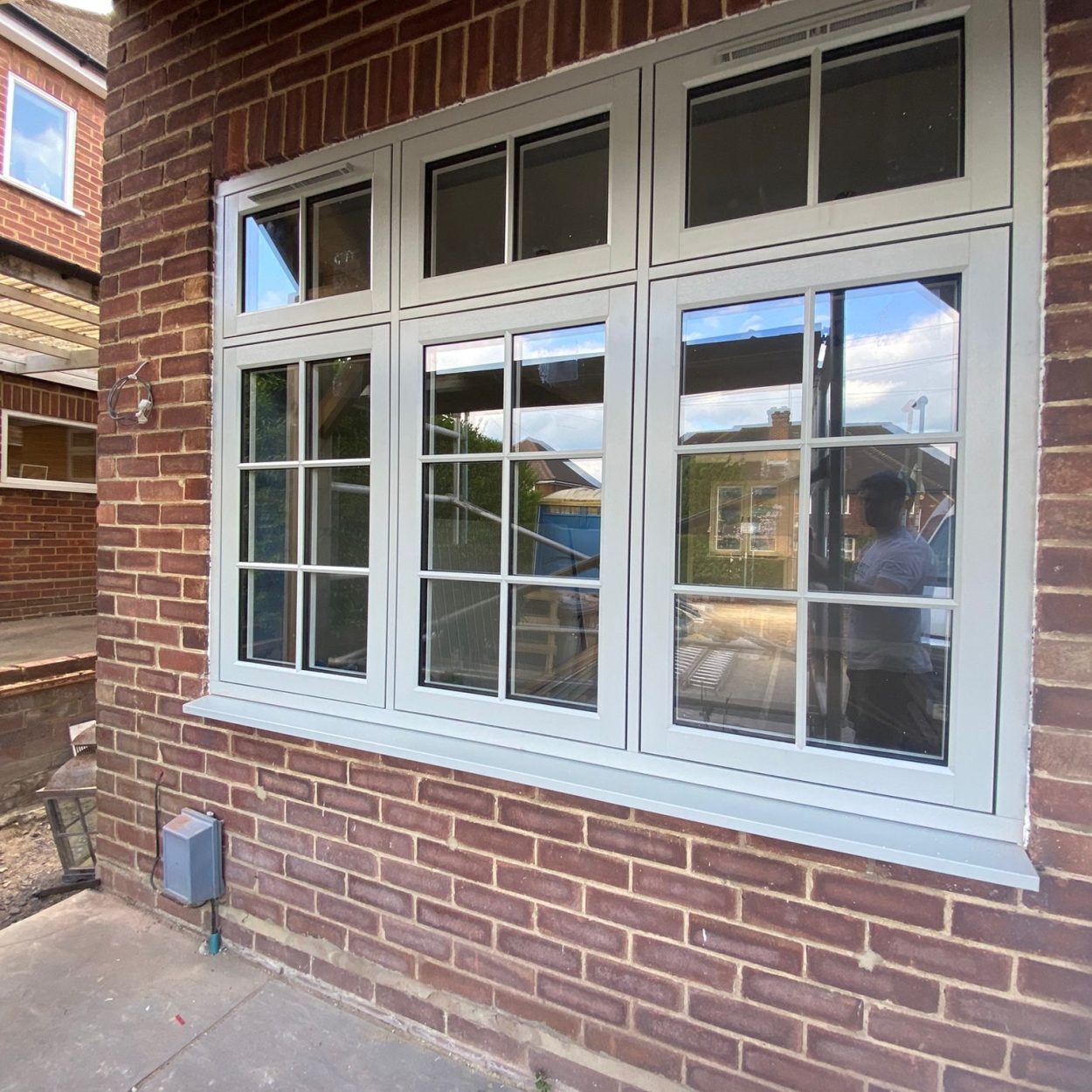 Guildford property featuring Residence 7 uPVC window with astragal bars and energy-efficient glazing