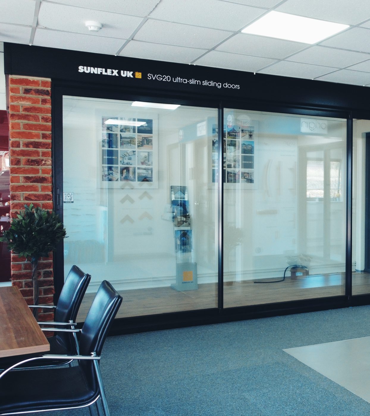 Sunflex UK SVG20 ultra-slim sliding door display in the Cedar Views showroom